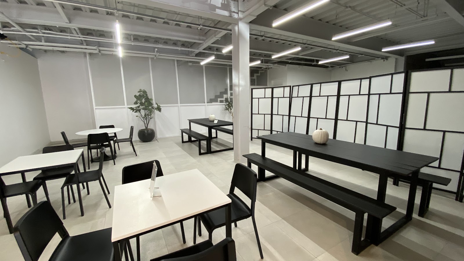 Zona de mesas de Lumi Café